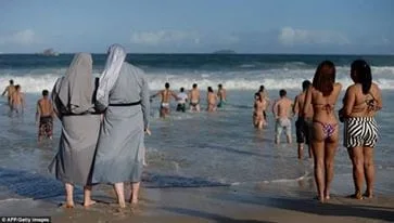 بين النقاب ولباس الراهبات في البحر :    إسبانيا تحت الضوء